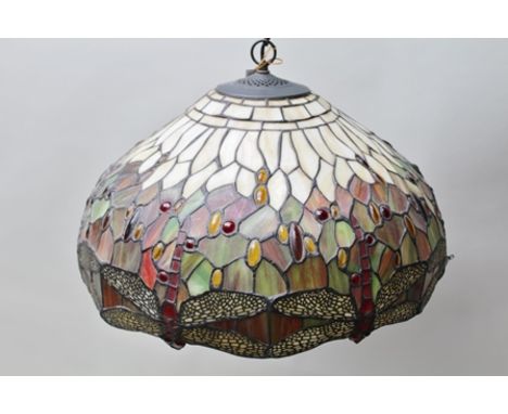 A TIFFANY STYLE HANGING LIGHT SHADE, with leaded coloured glass in a dragonfly design, ring suspension, chain and brass ceili