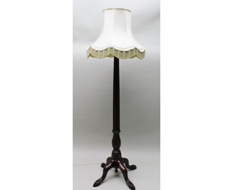 A MAHOGANY STANDARD LAMP with shade 