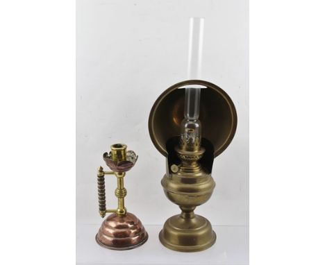 A BRASS OIL LAMP with chimney and rotating focusing shade, 30cm high (without chimney) circa 1910, together with a COPPER AND
