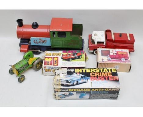 A TIN-PLATE MODEL OF A SHUNTER ENGINE, and a Mettoy Playthings tin-plate farm tractor, Warner Bros old fashioned tin truck co