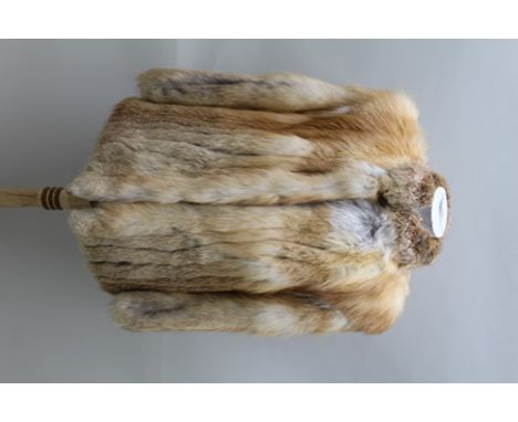 A NATURAL CANADIAN RED FOX LADY'S FUR JACKET, 74cm long, 117cm sweep (together with a 1987 valuation for £800) 