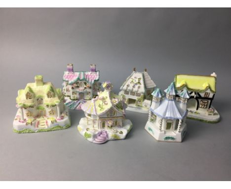 LOT OF COALPORT CERAMIC HOUSES, along with another ceramic house