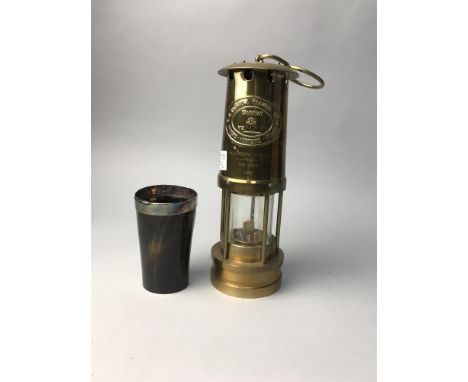 MINER'S LAMP WITH A HORN CUP