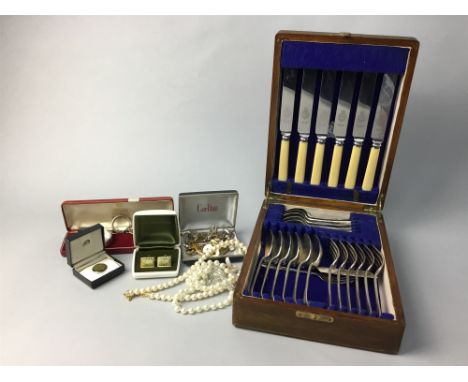 OAK CASED CANTEEN OF CUTLERY, along with British and foreign coins, cufflinks and a compass