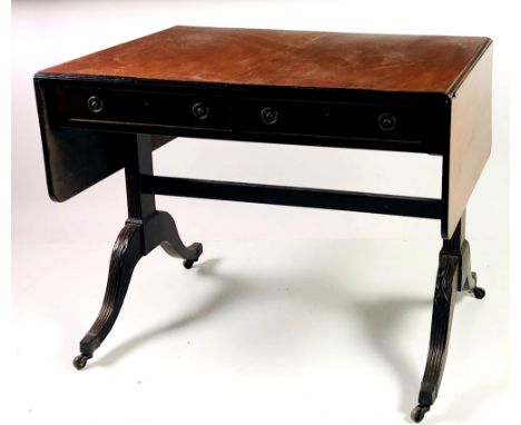 A 19th Century mahogany drop leaf Sofa Table, the plain top over a frieze with two drawers with circular brass handles, on re