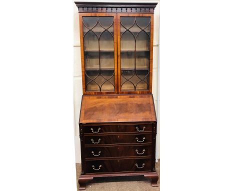 A pair of fine quality Chinese Chippendale style mahogany Bureau Bookcases, by O'Connell's of Cork, the dental moulded cornic