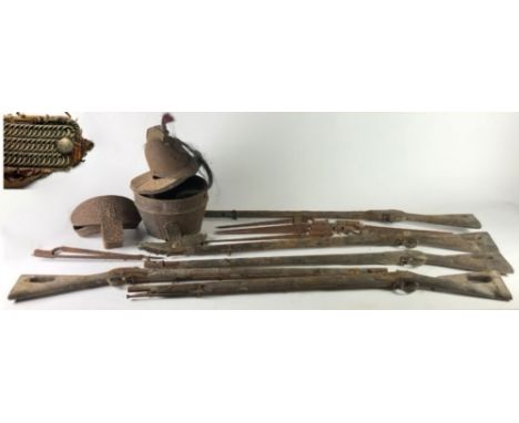 Relics of The Waterford MilitiaA group of items including 5 long percussion Militia Rifles, 8 bayonets, a metal helmet, 2 par