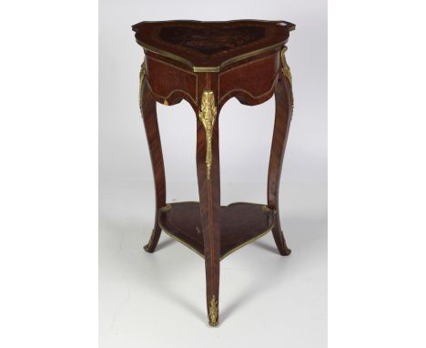 A 19th Century French style kingswood and marquetry Pedestal Table, of triangular form, the shaped top with inlaid musical bo