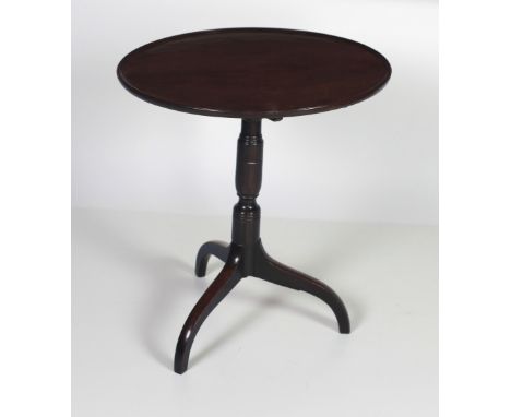 A good quality George III Occasional Table, of low proportions, the circular moulded top supported by turned pillar on tripod