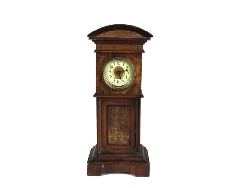 A miniature walnut and parcel gilt Longcase Clock, with arched pediment above a circular enamel dial with Arabic numerals and