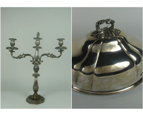 Two graduating 19th Century melon shaped plain silver plated Dish Covers; and a heavy 19th Century three light two branch Can