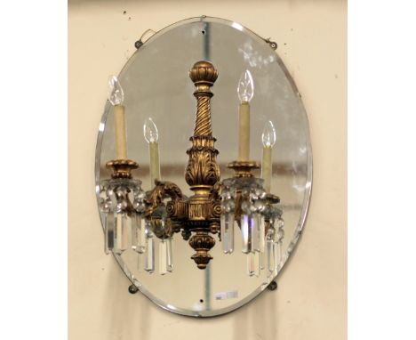 A pair of Georgian style carved giltwood two light Girandoles, each with crystal icicle drops, the scroll arms carved with fo