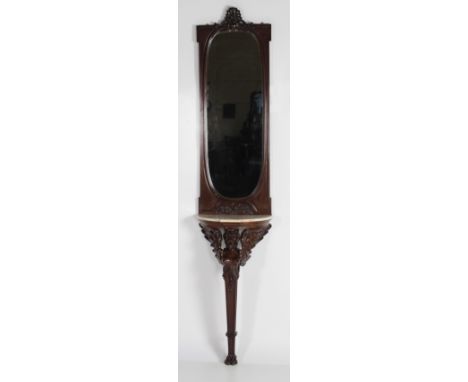 An unusual carved mahogany marble top Console Table and Mirror of narrow proportions, the exquisitely carved winged figure wi