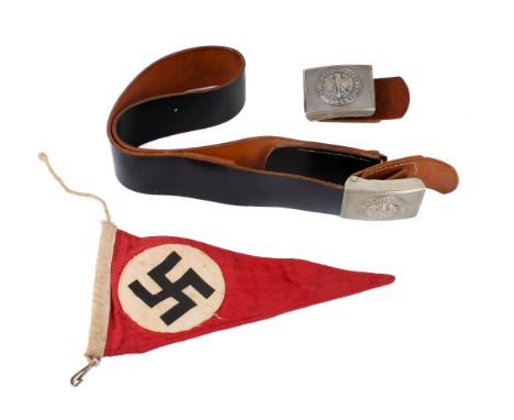 A WWII or later German Army pennant and two belt buckles. The buckles with central eagle inside an inscription reading "Einig