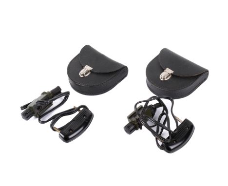 Two lighting units for Russian TXK 10x80 binoculars, in black pouches. No visible serial numbers. 