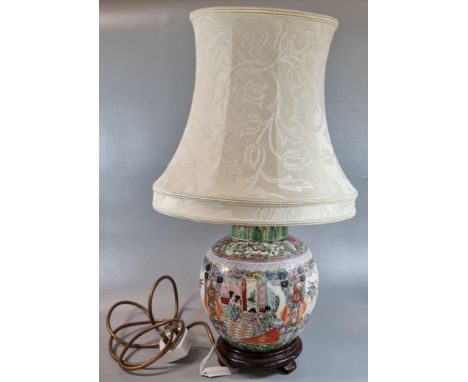 Oriental Macau decorated porcelain polychrome ginger jar in Canton style now as a table lamp with fabric shade and base. (B.P