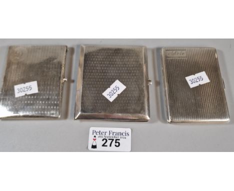 Three silver engine turned cigarette cases. 7.6 troy oz approx. (B.P. 21% + VAT)