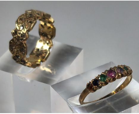 9ct gold multi-coloured seven stone dress ring. 1.5g approx. Size N1/2, together with another 9ct gold eternity style ring. 3