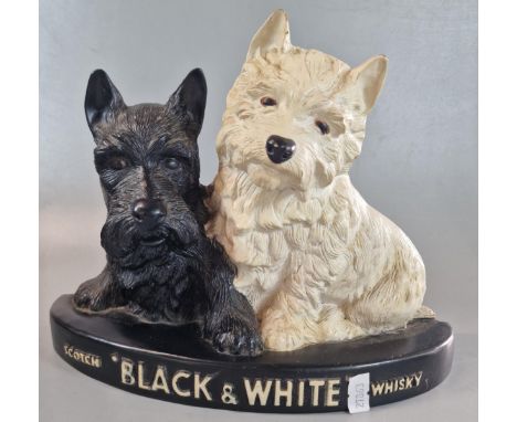 Probably 1960s Black and White Scotch Whisky  Bar back advertising sculpture, with black and white Scotty dogs. 20cm high app
