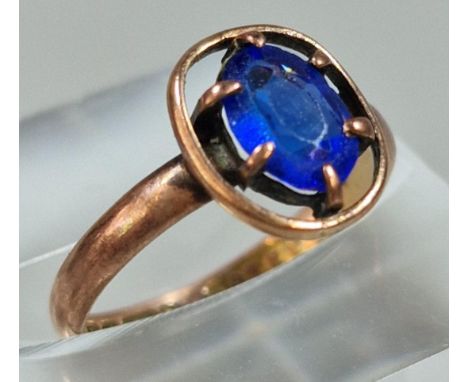 9ct gold and blue stone dress ring. 1.3g approx. Size I. (B.P. 21% + VAT)