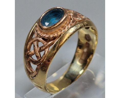9ct gold Clogau Celtic design ring set with blue topaz. 5.5g approx. Size Q1/2. (B.P. 21% + VAT)