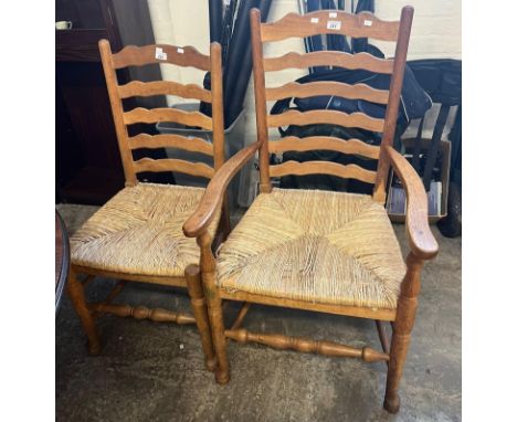 Set of eight 20th century pale oak Lancashire style ladder backed dining chairs with sea grass seats. Six single, two elbow c