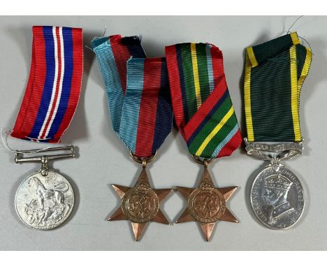 WWII medal group of four comprising: 39-45 Star, Pacific Star, 39-45 War Medal and Territorial Efficiency Medal being named -