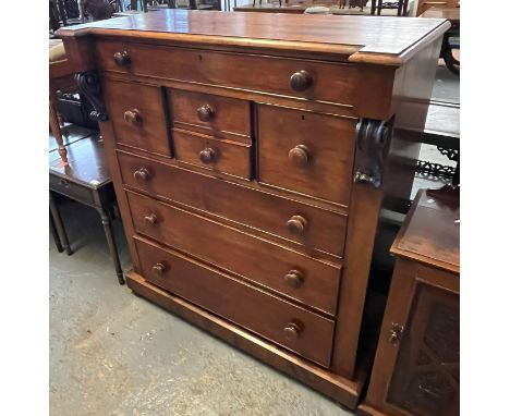 Late Victorian mahogany Scotch chest, having moulded edge top with projecting scrolled corbels, long cock beaded upper drawer