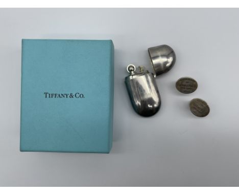 Tiffany &amp; Co. HM Silver Elsa Peretti Coffee Bean Lighter along with Tiffany &amp; Co HM Silver Cufflinks. 