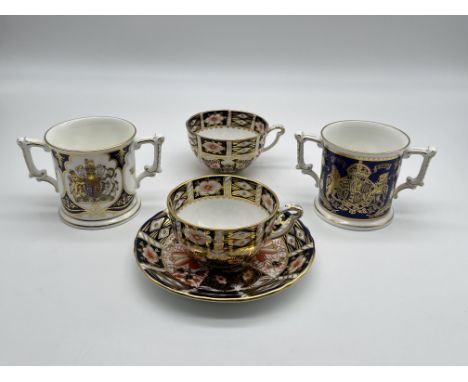 Royal Crown Derby - Traditional Imari Two Saucers and a Cup, Royal Crown Derby - Queen Elizabeth 70th Birthday Loving Cup, an