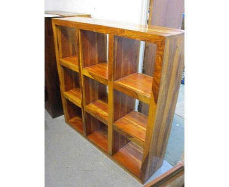 A modern mango wood nine section display shelf 