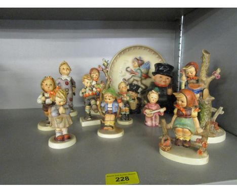 A group of Hummel/Goebel figurines 