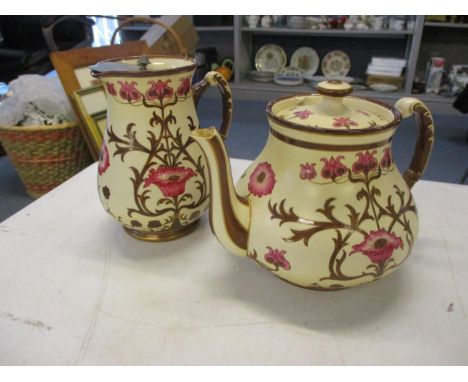 A MacIntyre teapot with a milk jug 