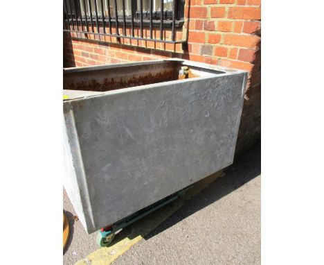 A galvanized water trough 