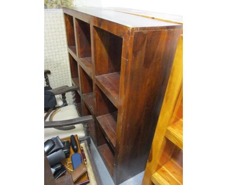 A modern mango wood nine section display shelf 