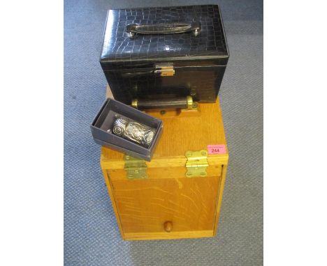 A mid 20th century oak coal scuttle with a Bakelite handles, a faux leather jewellery box and a plated model owl, together wi