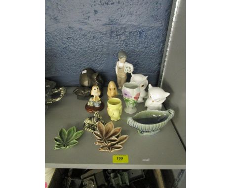 A small group of ceramic ornaments to include a Sylvac dog, a Nao figurine and other items 