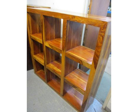 A modern mango wood nine section display shelf 