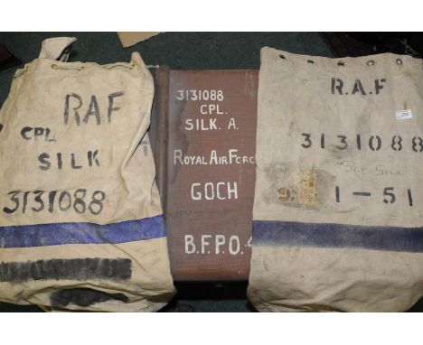 Two RAF issue holdall kit bags marked Cpl Silk RAF 3131088 and associated travelling trunk marked 313108 Cpl Silk .A Royal Ai