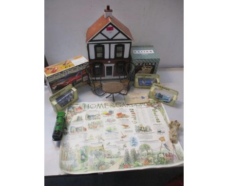 An interesting lot of toys and other items to include a Georgian style two storey dolls town house with attic and sash window