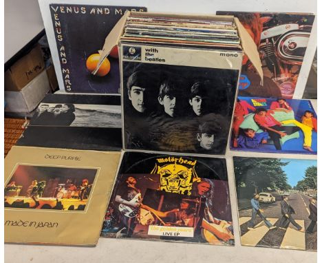 A group of LP/records of various genres to include The Beatles, Motorhead, The Rolling Stones, U2, Deep Purple and othersLoca