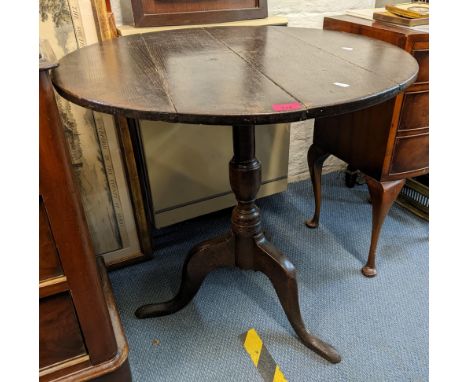A Georgian oak circular topped tripod occasional table on three splayed legs, 71cm h x 72.5cm wLocation: 