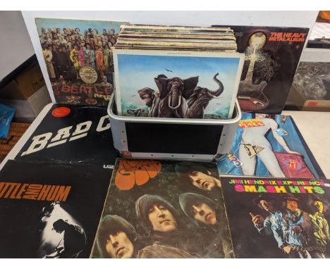 A group of LP/records of various genres to include The Beatles, Jimi Hendrix, U2, The Rolling Stones, Bad Company, Elvis Cost