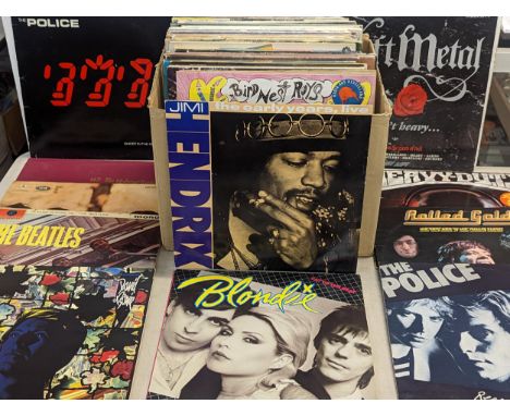 A group of LP/records of various genres to include The Beatles, David Bowie, Rolling Stones, Jimi Hendrix, U2, The Police, Bl