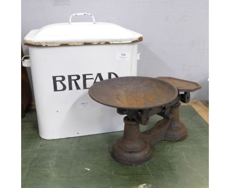 An enamel bread bin and a set of kitchen scales and weights 