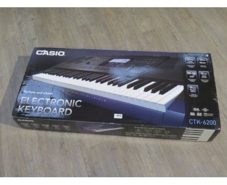 A Casio CTK-6200 electronic keyboard, boxed 
