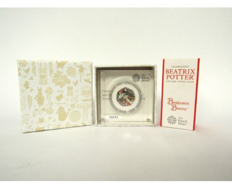 A Royal Mint Beatrix Potter Benjamin Bunny enamel 50p piece, cased with certificate, boxed 