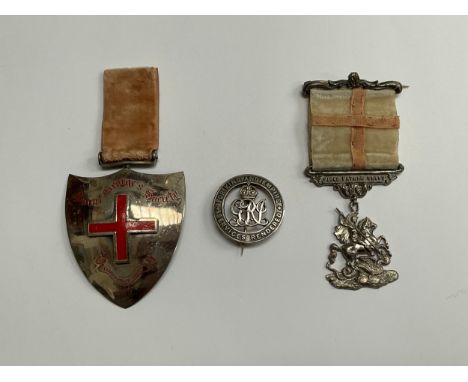 Henry Garbutt silver St Johns medal inscribed 1850 and St George Society Shield medal and services rendered badge (3) 