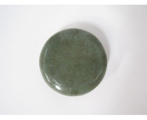 A late 19th / early 20th Century jade lidded pot with character mark to top 