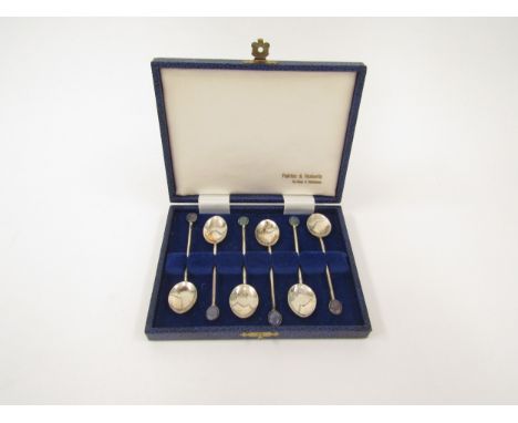 A set of six sterling silver coffee spoons with opal set terminals, within Fairfax and Robert’s of Sydney and Brisbane, 43g 